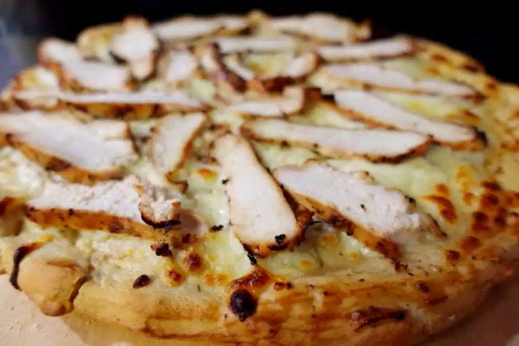 chicken-caesar-salad-pizza-baked-ready-for-salad-topping