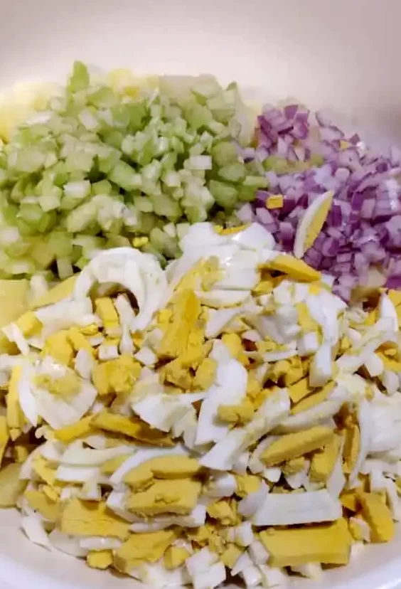 potato salad ingredients, hard boiled eggs, red onion, celery chopped