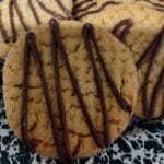 peanut butter cookie drizzled with chocolate.