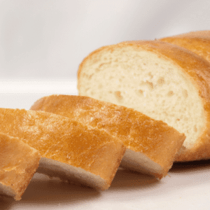 french bread sliced on white plate