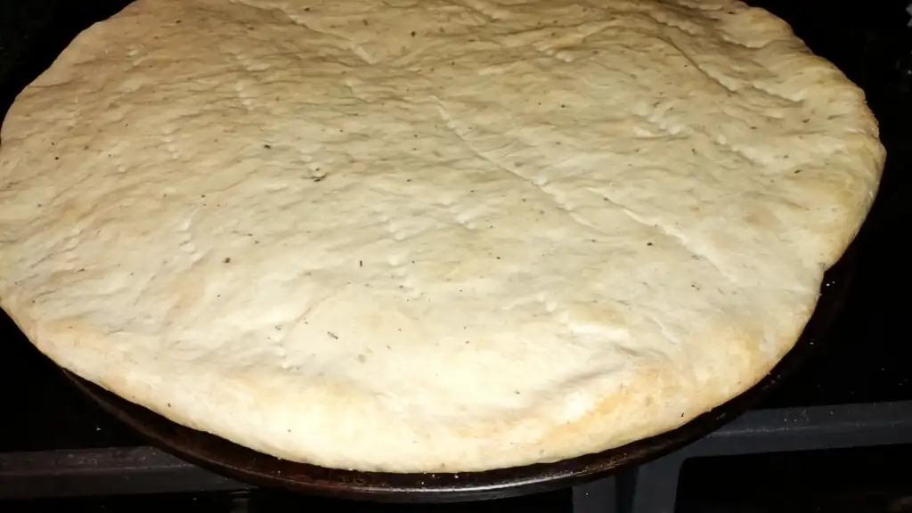 finished-baked-pizza-crust-coming-out-of-oven.