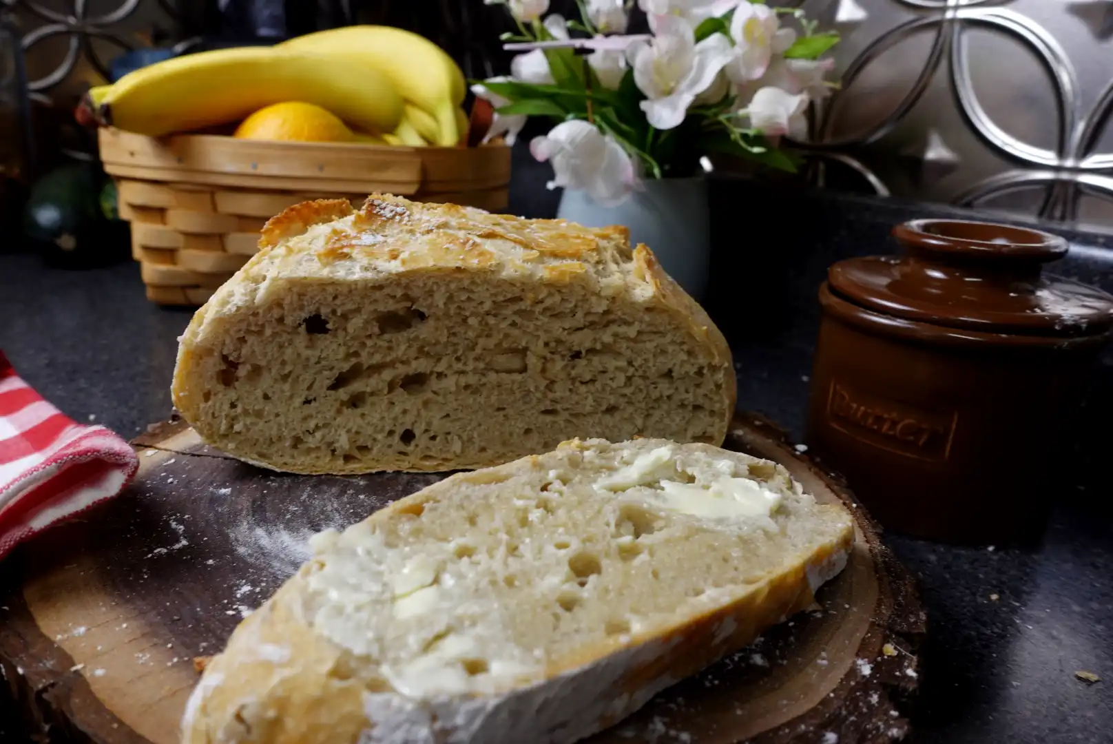 no-knead-bread-cut-with-buttered-slice