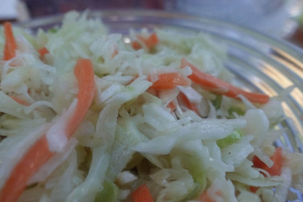 pepper slaw in a clear bowl