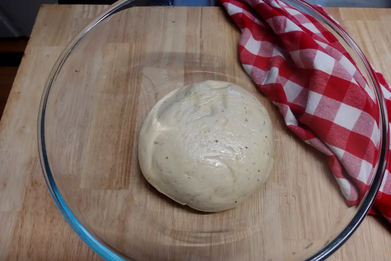 pizza-dough-in-bowl-with-a-rub-of-olive