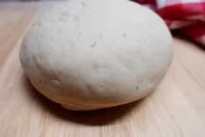 pizza-crust dough-on-board