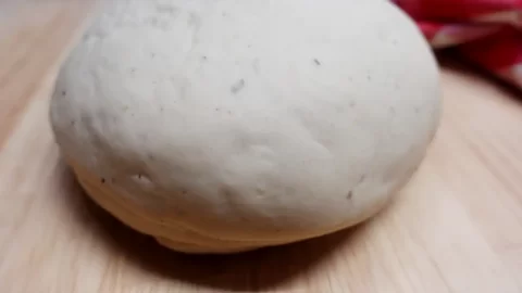 pizza-crust dough-on-board