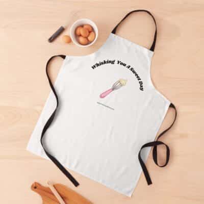 apron that says whisking you a happy day