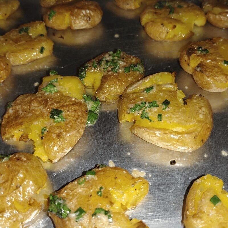 baby smashed potatoes on a baking tray