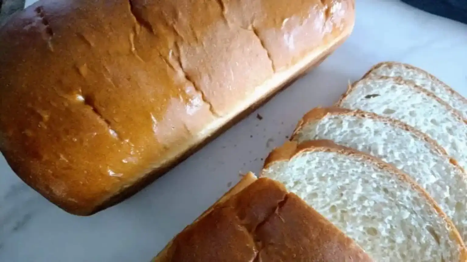 amish white bread sliced on a white tray