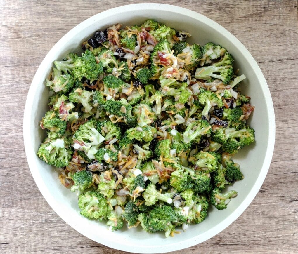 broccoli salad in white serving bowl