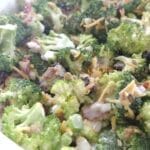 broccoli salad in white bowl