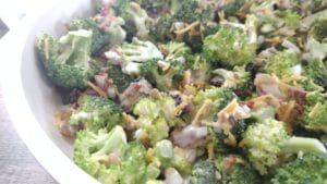 broccoli salad in white bowl