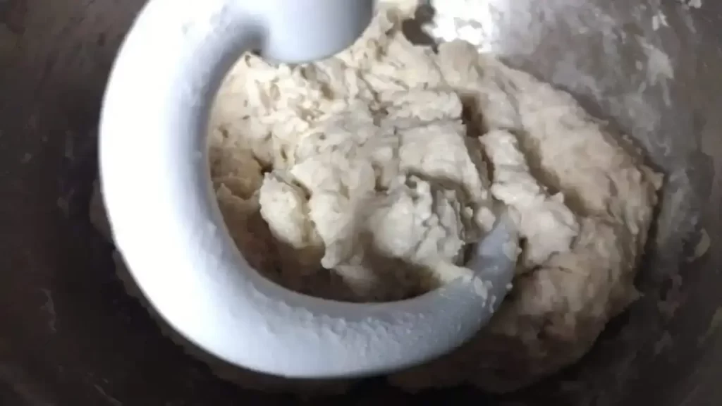 amish white bread dough being mixed with dough hook