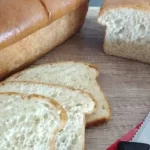 amish white bread with a white checkered towel