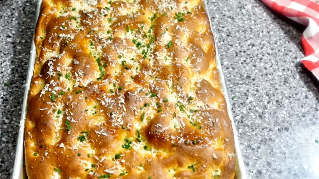 top-view-focaccia-bread-with-garlic-and-chives.