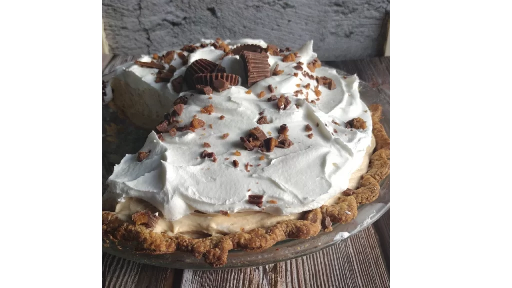 whole peanut butter pie with reese cups on top