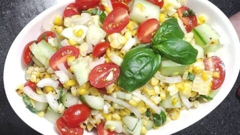 grilled corn salad recipe in white serving dish