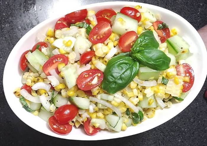 grilled corn salad recipe in white serving dish