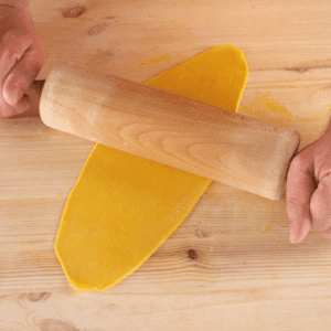 rolling out homemade pasta dough