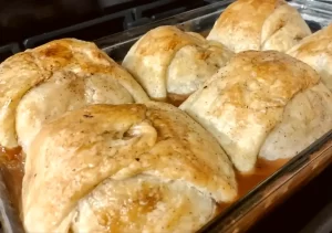 side view of apple dumplings in 9 x 13