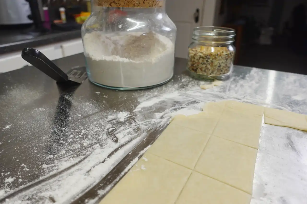 homemade-everything-crackers-recipe-dough-being-rolled