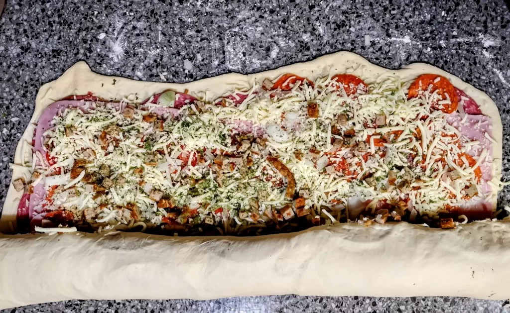 rolling-up-stromboli.