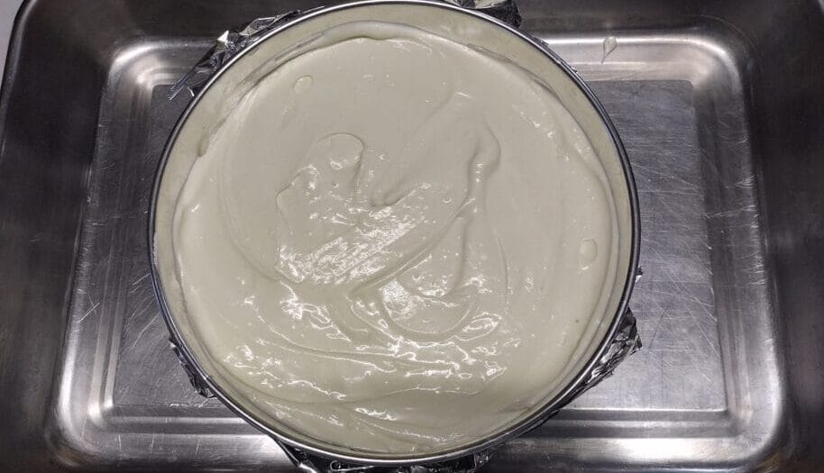 cheesecake in pan ready to bake