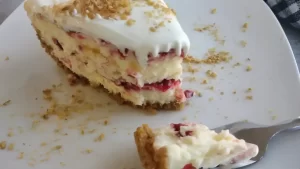 cherry-swirl-cheese-cake-on-white-plate