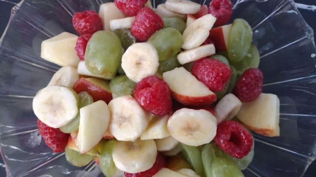 lemon glazed fruit salad apples bananas, raspberries, grapes