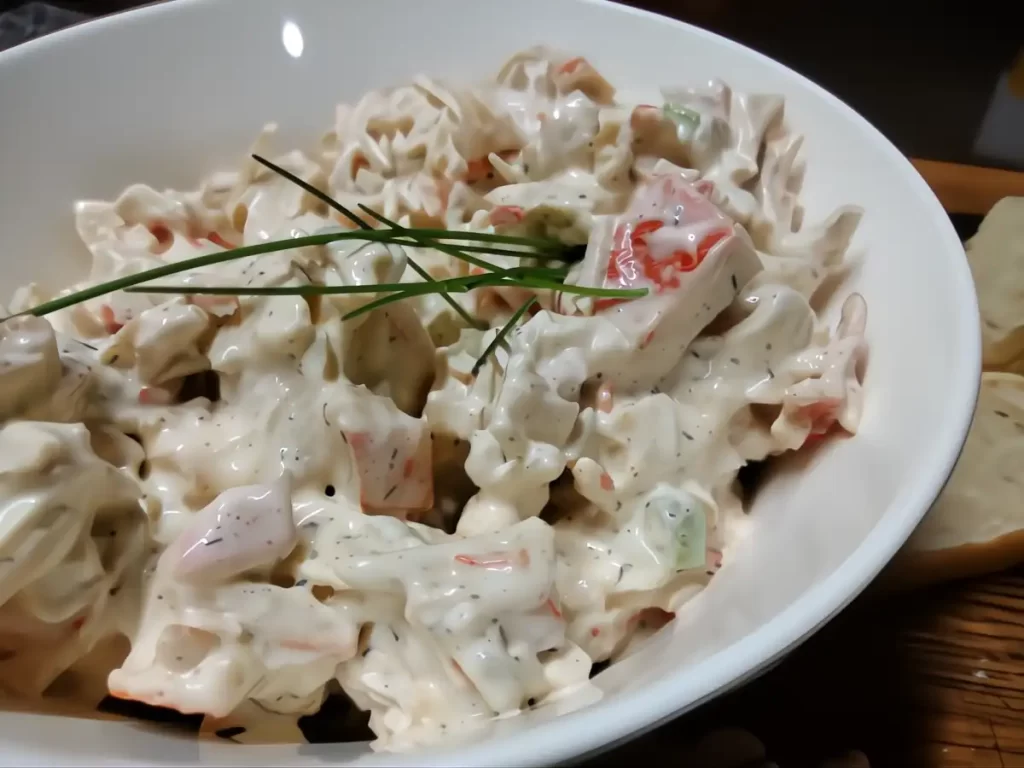 seafood salad in white bowl