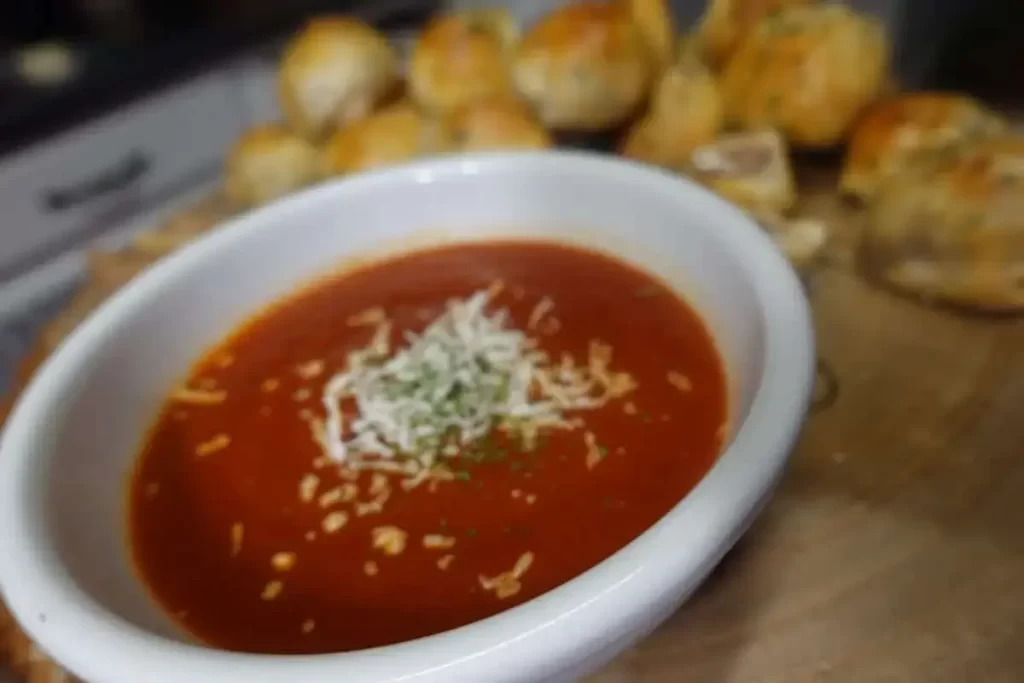 marinara served alongside meatball bombs