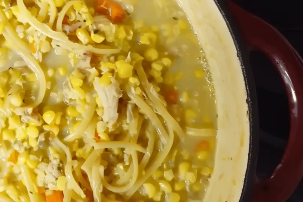 close-up-of-chicken-corn-soup-in-dutch-oven.