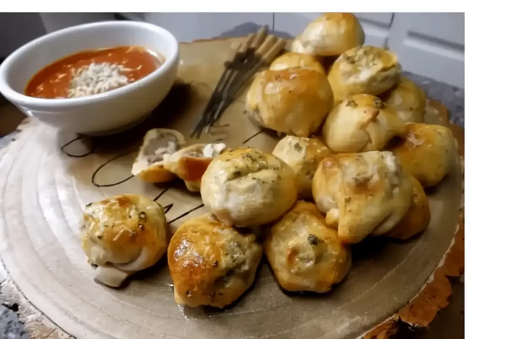 meatball-bombs-on-wooden-tray-with-dipping-sauce