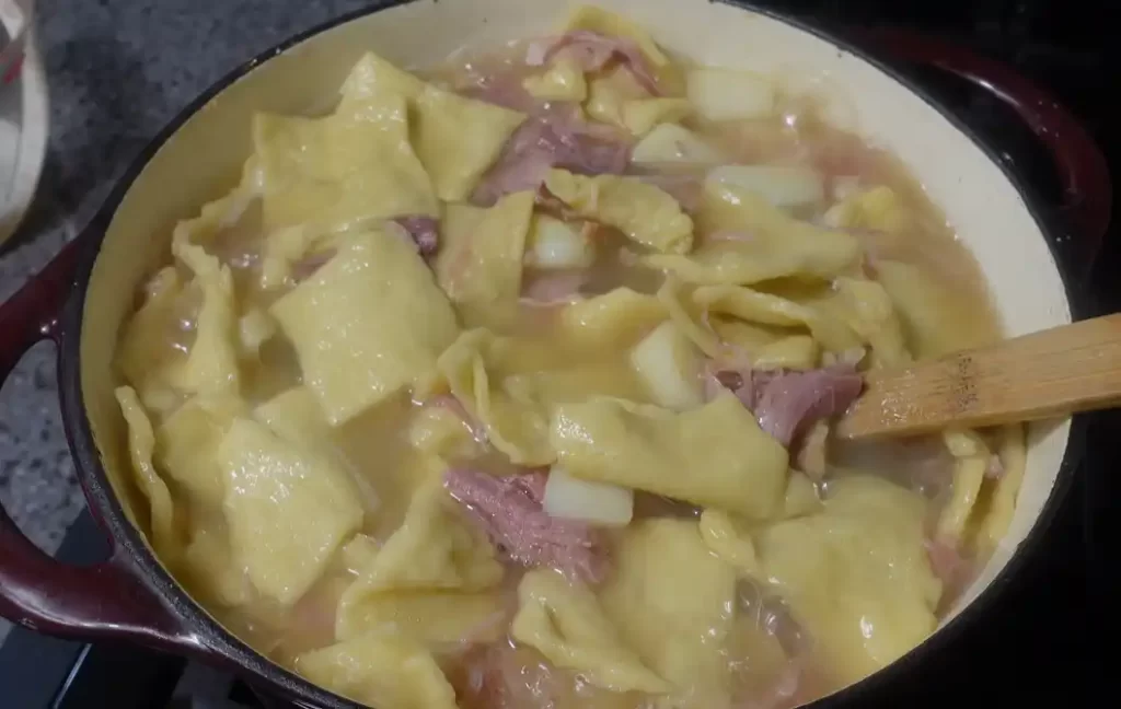 ham pot pie simmering in a pot