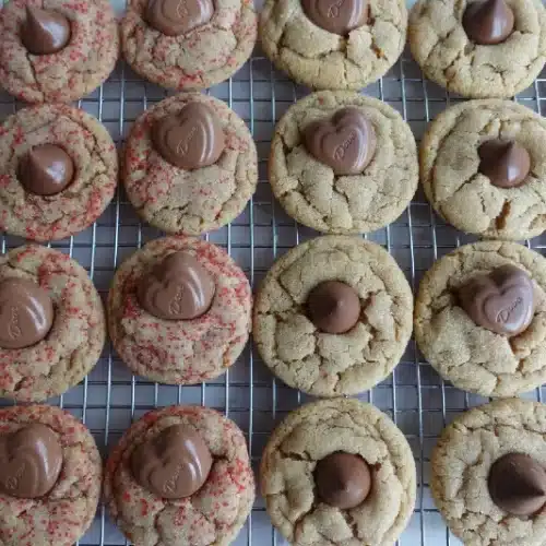 peanut butter blossoms cookies on wire rack