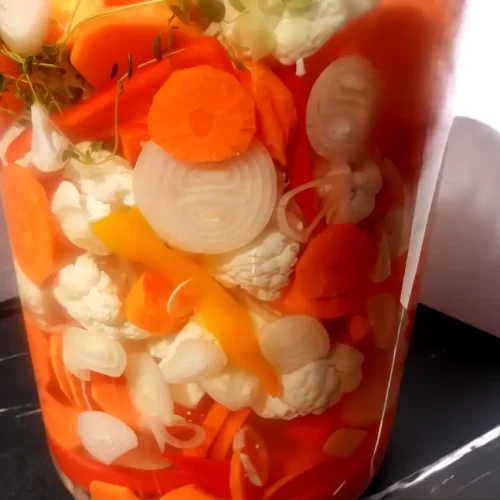 pickled vegetables in gallon jar