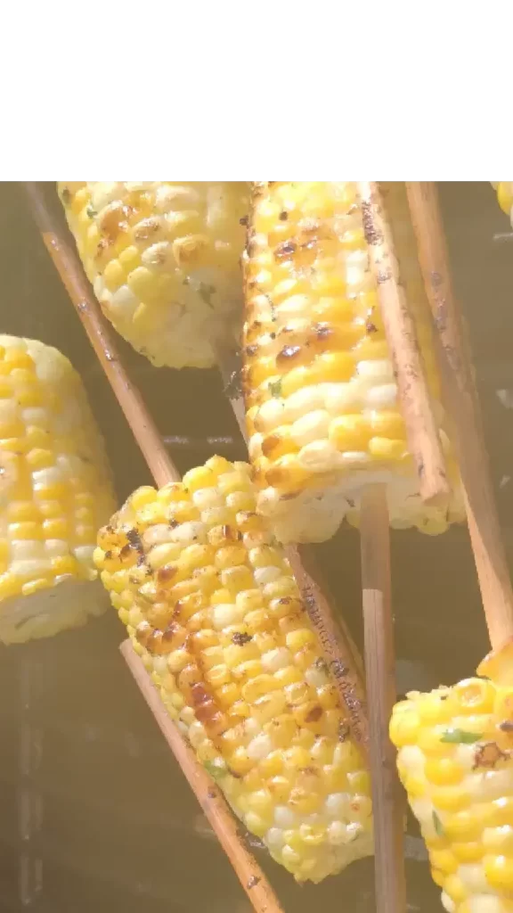 grilled corn on the cob with skewers