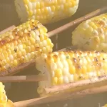 grilled corn on the cob with skewers