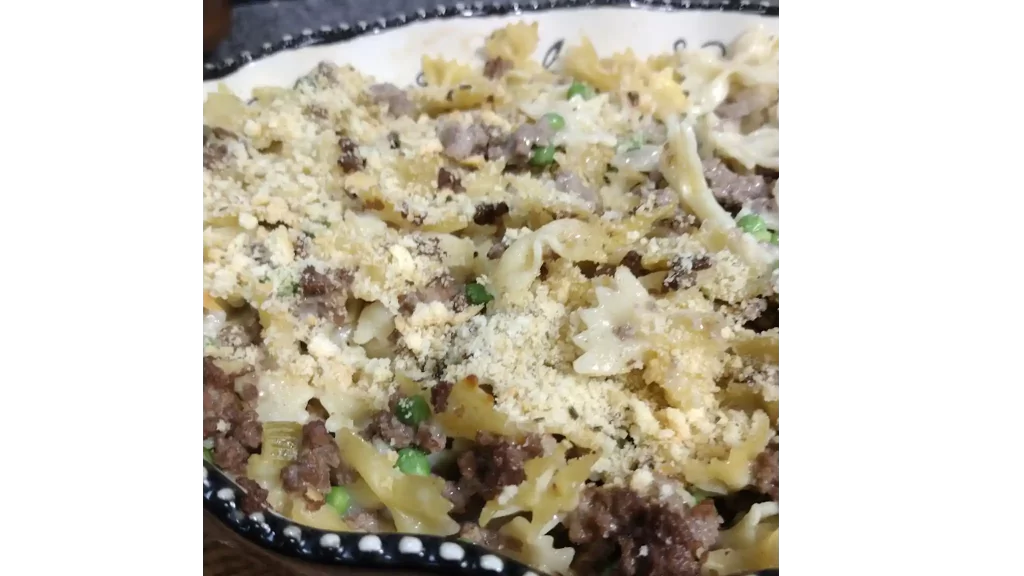 hamburg noodle casserole recipe in dish topped with breadcrumbs