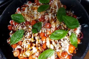 chicken caprese recipe in cast iron skillet