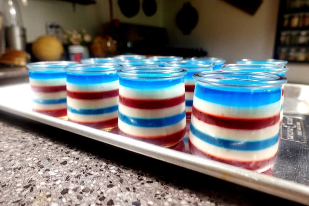 layered jello cups on silver tray