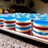 layered jello cups on silver tray