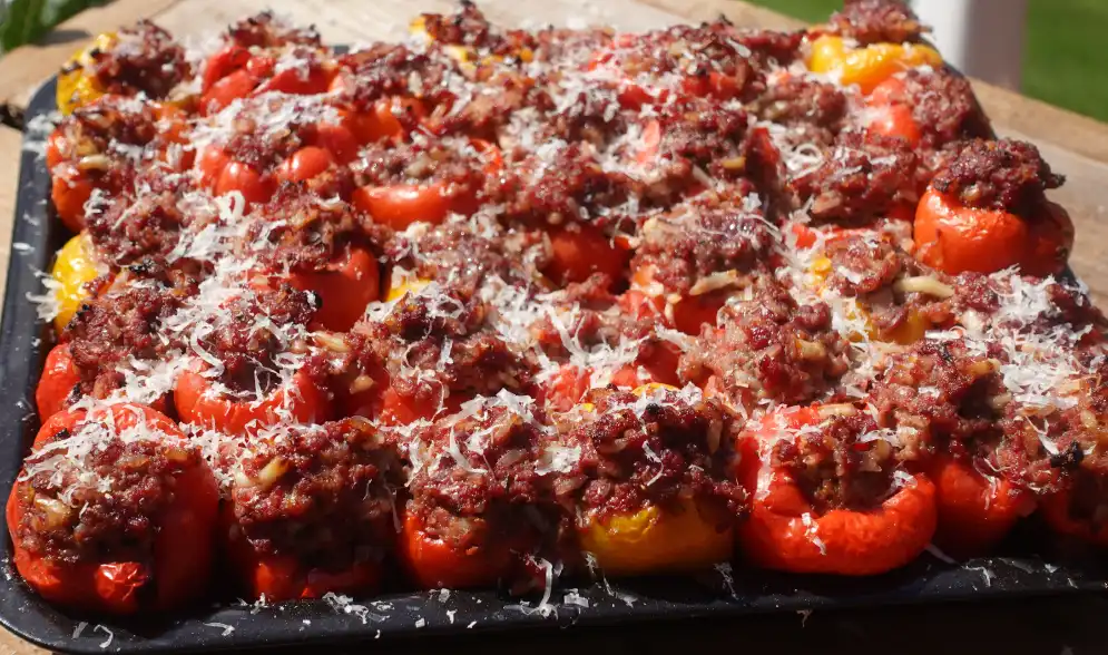 mini smoked peppers cooked in rimmed pan