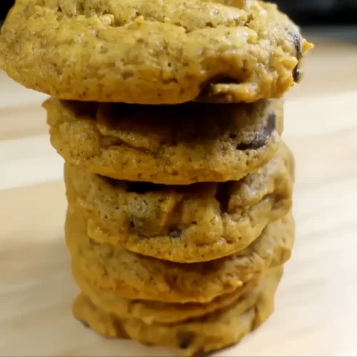 pumpkin chocolate chip cookies in a stack