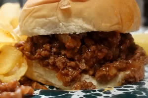 up close image of sloppy joe in a bun