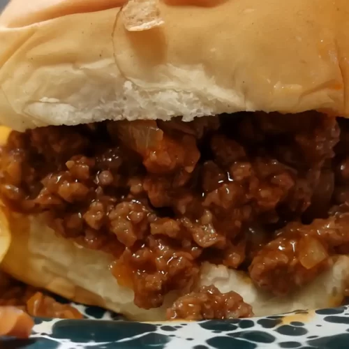 up close image of sloppy joe in a bun