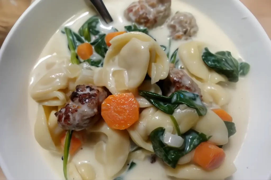 creamy-tortellini-soup-in-white-serving-bowl