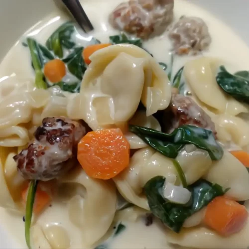 creamy-tortellini-soup-in-white-serving-bowl