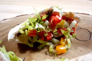 cheeseburger-pita-pocket on wooden board