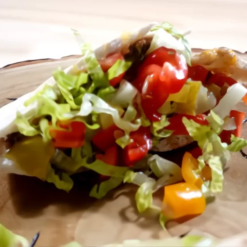 cheeseburger-pita-pocket on wooden board